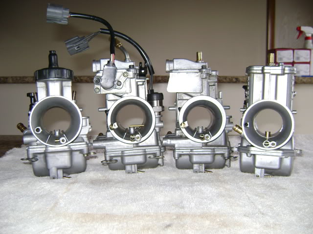 4 versions of the Keihin PWK carburetor with and without the air striker fins model