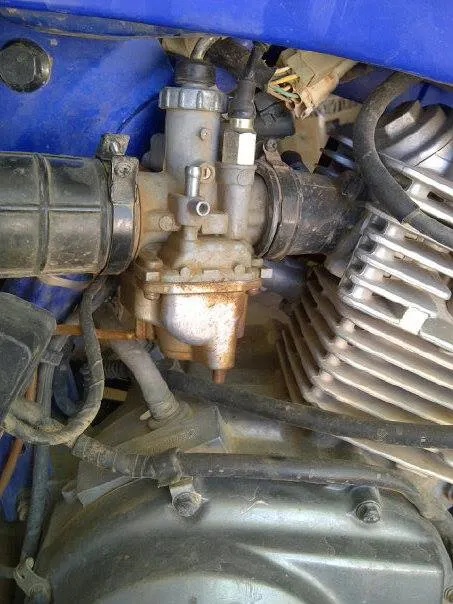 A stock Yamaha TTR 125 carburetor that is hard to start and tune that's about to be upgraded