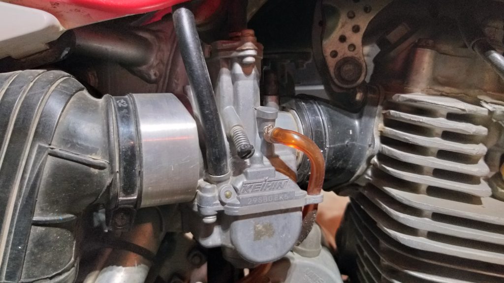 Keihin PWK carburetor on a Honda CRF230F trail dirt bike