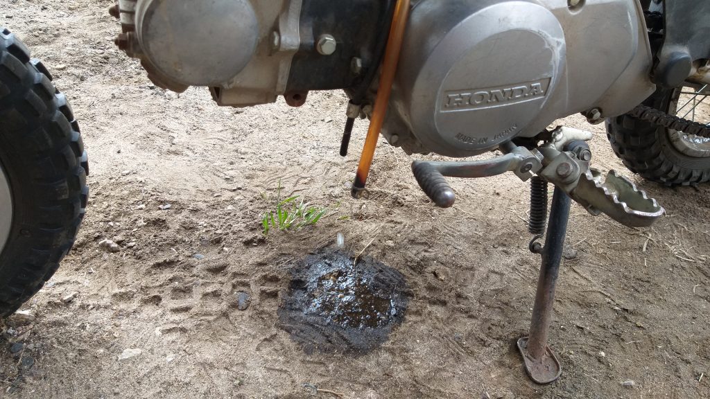 Honda XR50 dirt bike leaking gas out the carb overflow