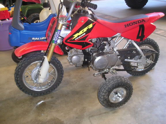 Honda dirt bike 2024 with training wheels