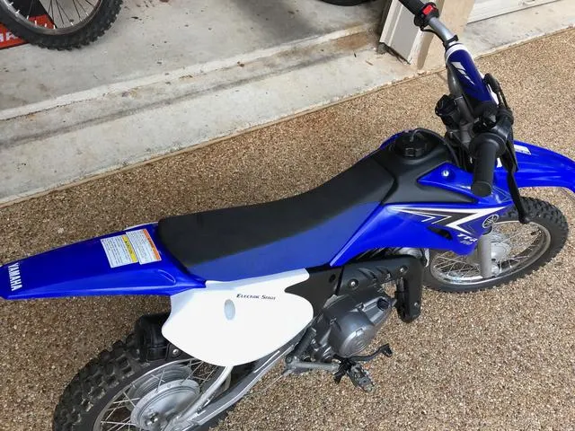 A stock Yamaha TTR110 4 stroke trail bike