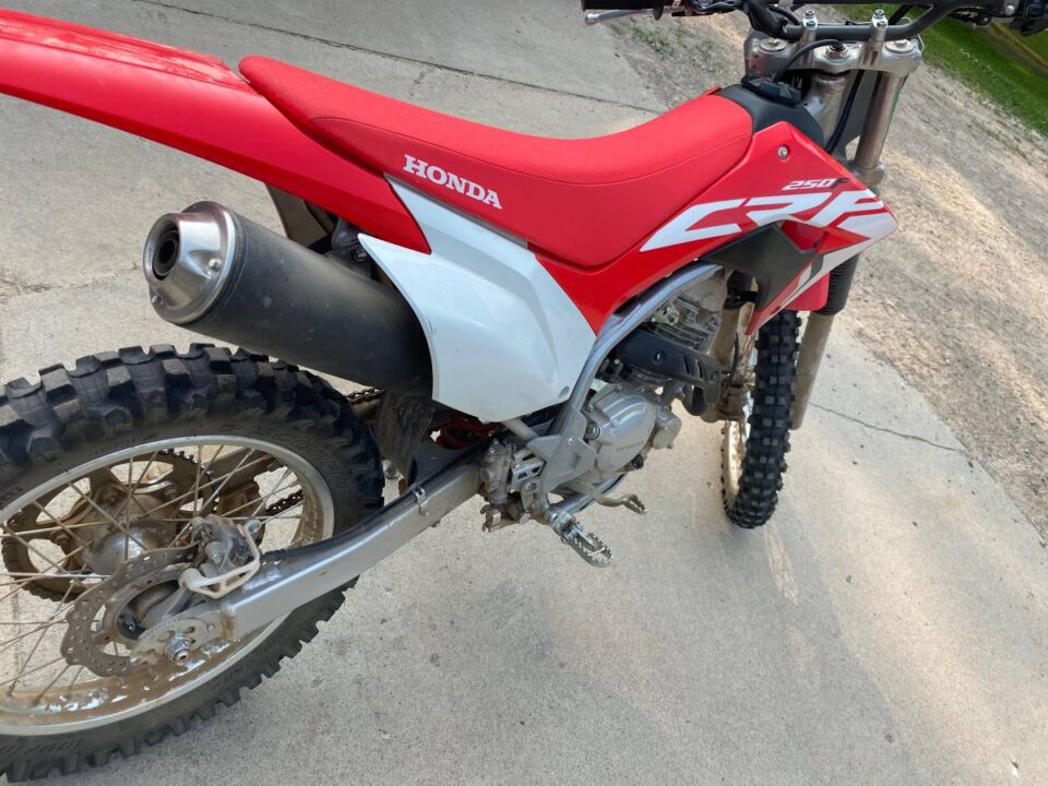 A stock Honda CRF250F is a good trail bike for beginner adults and teens that can handle a little extra weight.