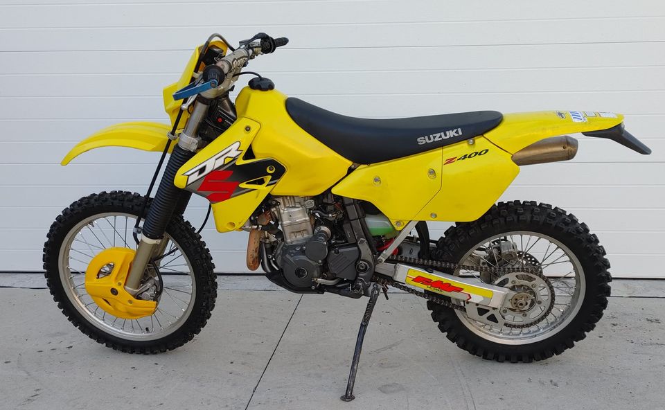 The Suzuki DRZ400 is a good lightweight dual sport bike that can handle some trail riding if you don't mind a little extra weight