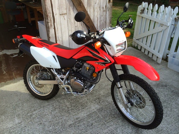 The Honda CRF230L is a dual sport dirt bike with headlight that's great for beginners