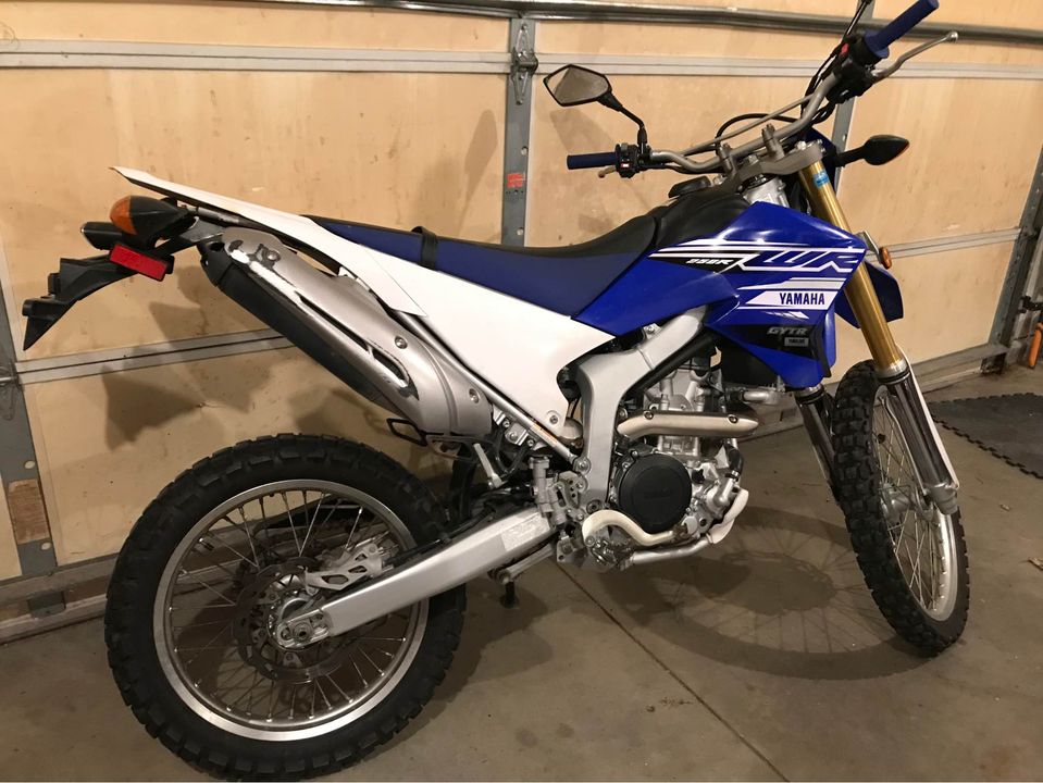 A clean stock Yamaha WR250R dual sport dirt bike