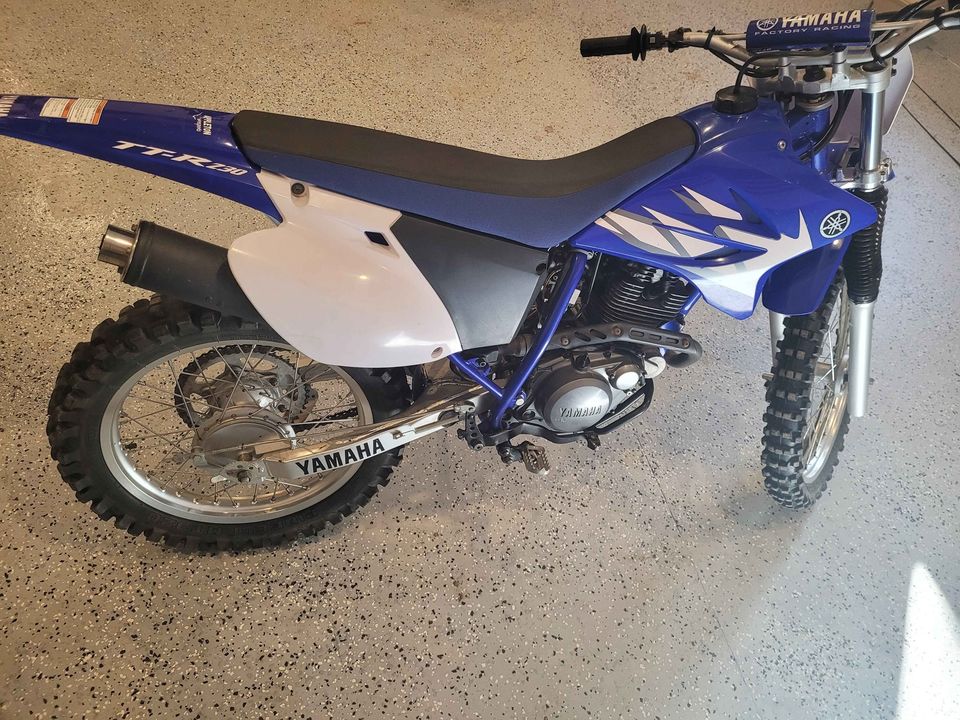 The TTR 230 is a good cheap dirt bikes for adults because it's easy to ride, reliable, and cheap to maintain