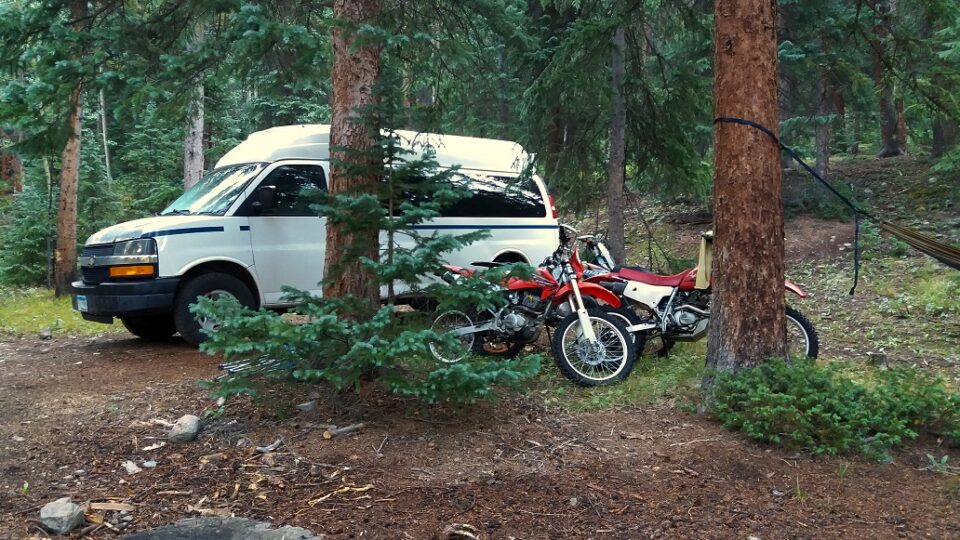 What vehicles can fit a dirt bike? A Chevy Express van without bench seats is a very popular and economical choice.