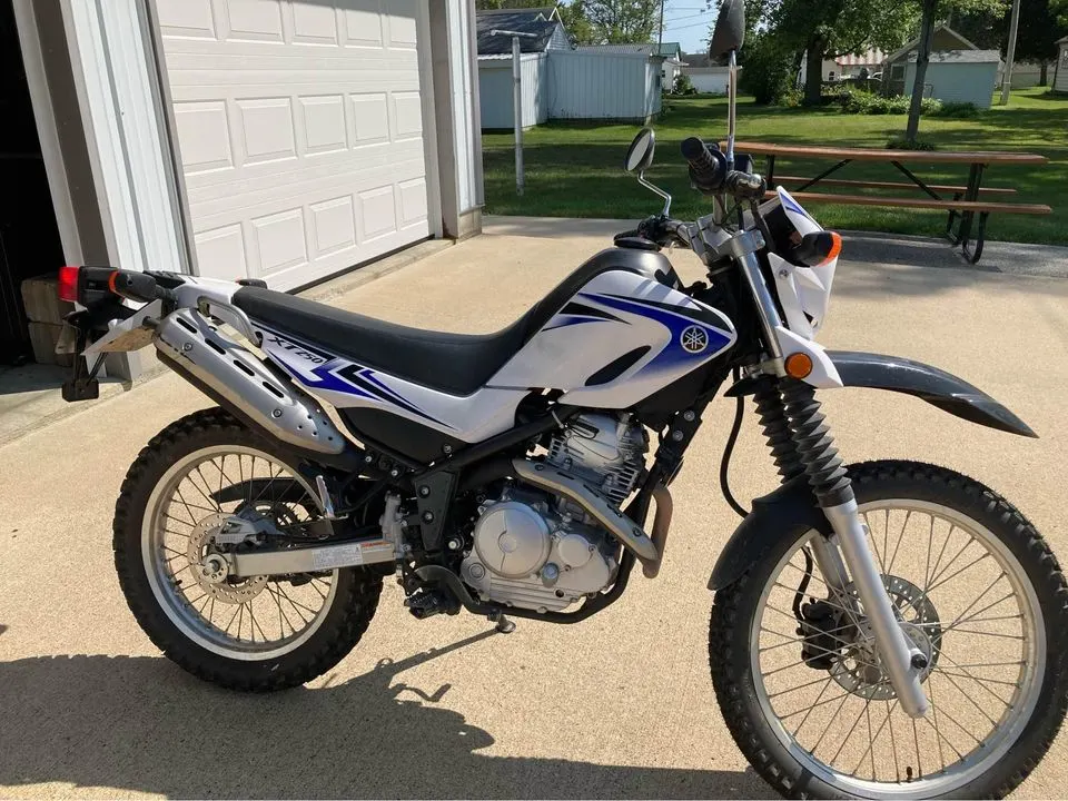 A clean stock 2009 Yamaha XT250 dual sport dirt bike