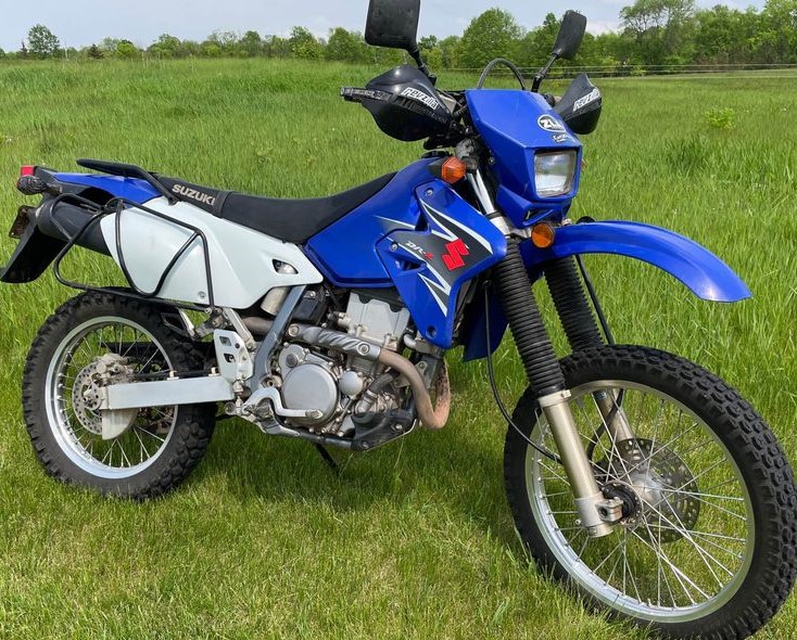 Blue Suzuki DRZ400S street legal dirt bike with side and top case racks