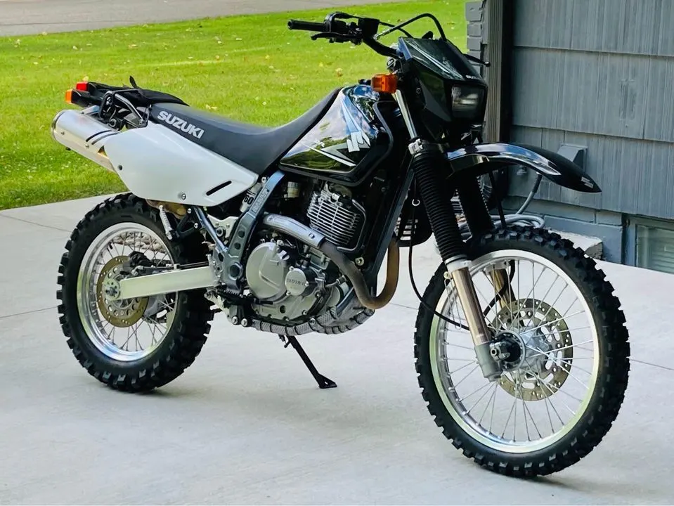 A 2009 Suzuki DR650 with some aftermarket parts for better comfort and power