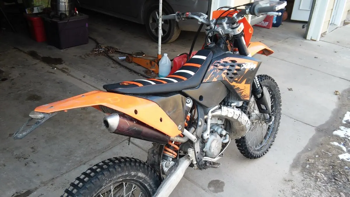 2008 KTM 200 XCW with FMF gnarly pipe, turbinecore spark arrestor, and rear trials tire