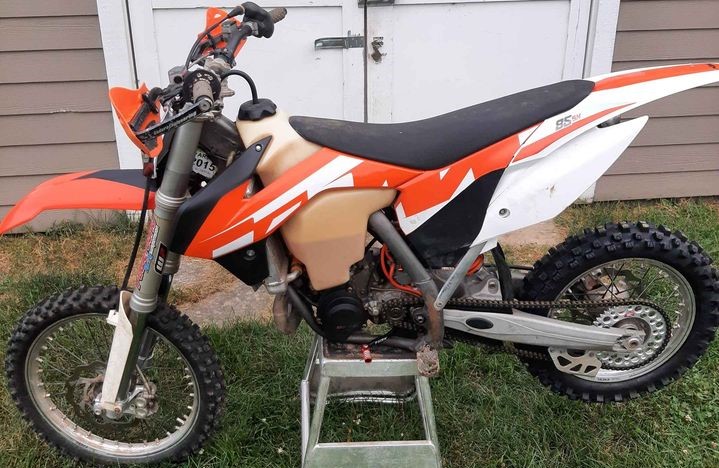 2014 KTM 85 SX with an aftermarket oversize fuel tank for trail riding
